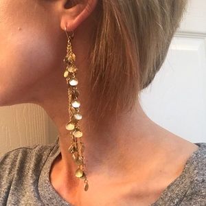 Long gold shell earrings